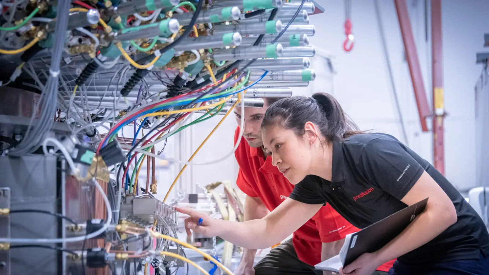 General Fusion engineers working on the LM26 compression system